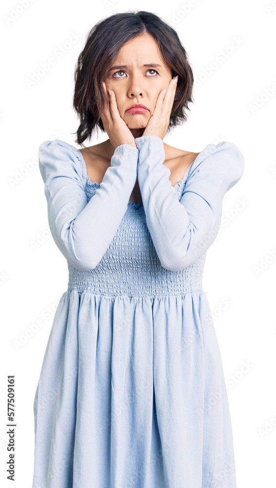 Young beautiful girl wearing casual clothes tired hands covering face, depression and sadness, upset and irritated for problem