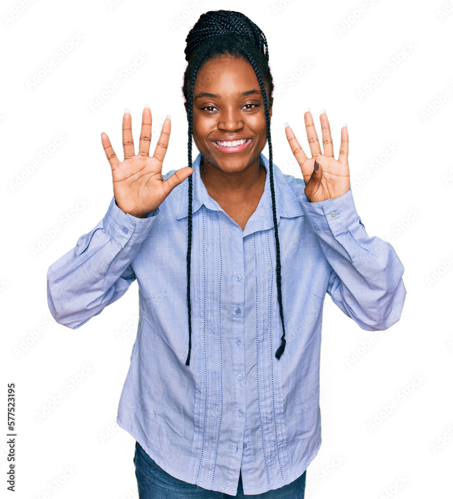 Young african american woman wearing casual clothes showing and pointing up with fingers number nine while smiling confident and happy. Young african american woman wearing casual clothes showing and pointing up with fingers number nine while smiling confident and happy.