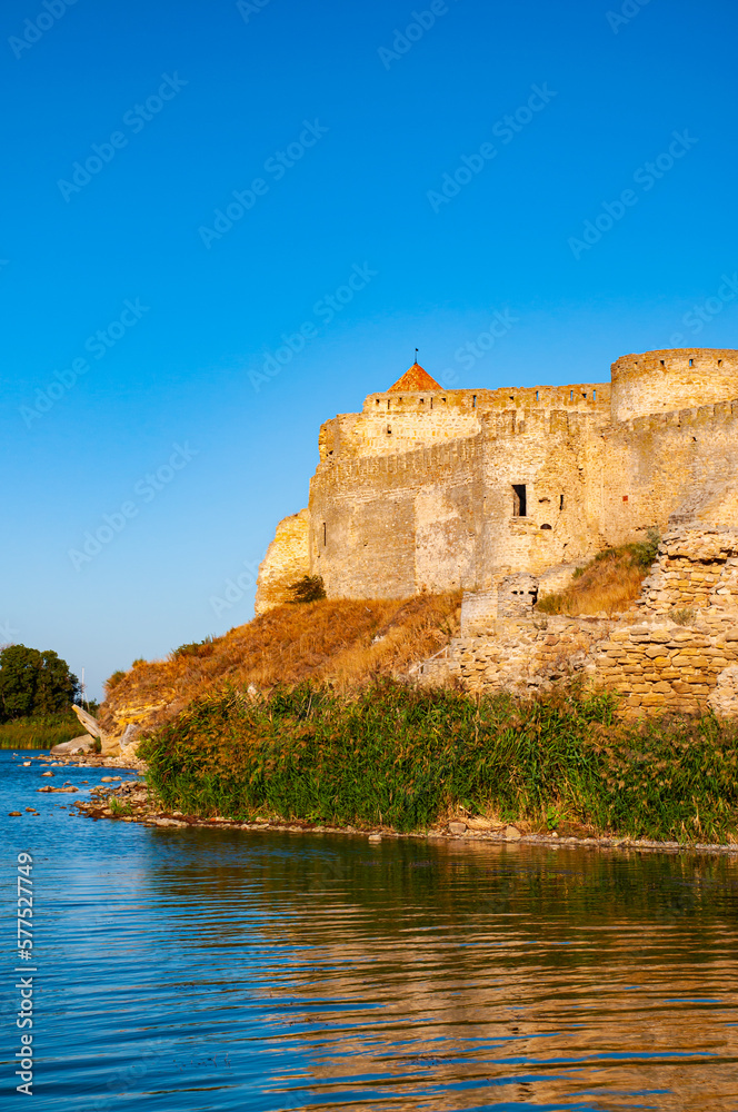 Beautiful sunny landscape with fortress and blue sky