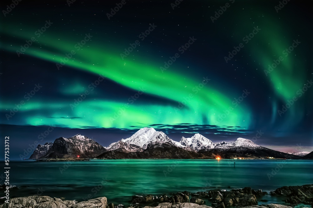 northern lights over the mountain
