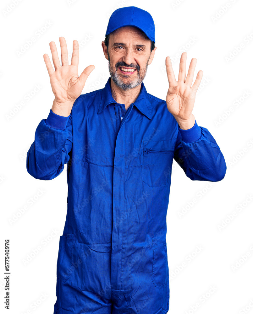 Middle age handsome man wearing mechanic uniform showing and pointing up with fingers number nine while smiling confident and happy.