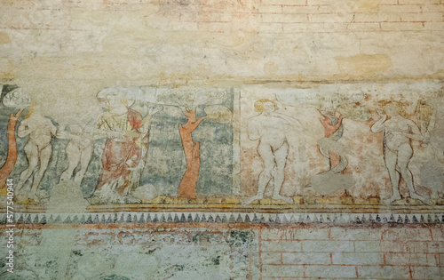 Adam and Eve story in paradise and their expulsion depicted on the fresco at Cahors Cathedral (site on Routes of Santiago de Compostela). Cahors, France