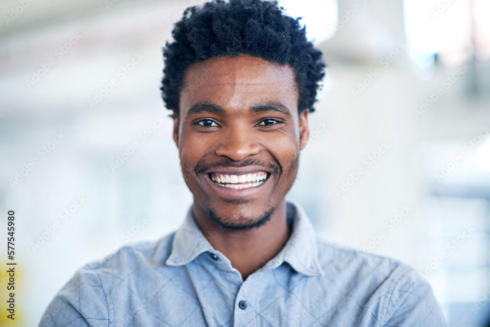 Im ready for success. Portrait of a handsome young businessman in his office. Im ready for success. Portrait of a handsome young businessman in his office.