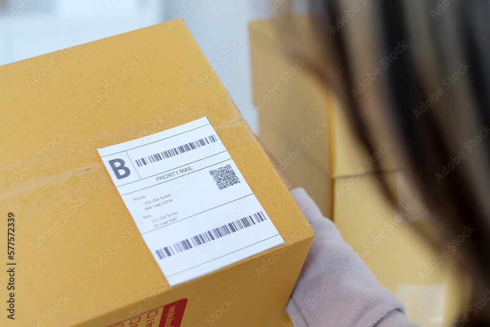 Closeup of barcode on product box for delivery to customer, small business Closeup of barcode on product box for delivery to customer, small business