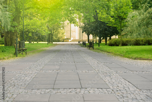 Beautiful view of tiled pavement in park. Sidewalk covering