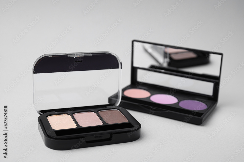 Beautiful eye shadow palettes on light background Beautiful eye shadow palettes on light background