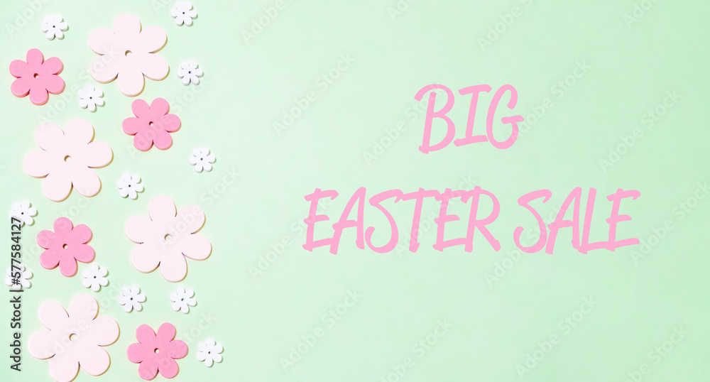 text Big easter sale on a pink background