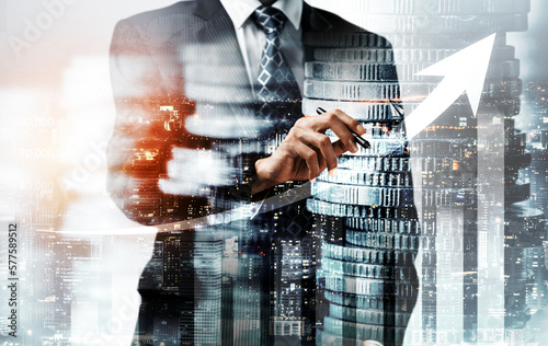Businessman analyst working with digital finance business data graph showing technology of investment strategy for perceptive financial business decision. Digital economic analysis technology concept.