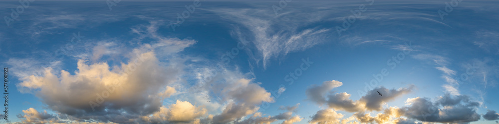 Dark blue sunset sky panorama with Cumulus clouds. Seamless hdr pano in spherical equirectangular format. Complete zenith for 3D visualization, game and sky replacement for aerial drone 360 panoramas.