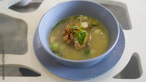 Oxtail soup is a soup made with beef tails served in a table