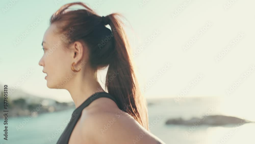 Running, beach fitness and fast woman with health challenge, cardio and exercise training in lens flare. Serious athlete, sports and runner person jogging by the ocean or sea with focus mindset Running, beach fitness and fast woman with health challenge, cardio and exercise training in lens flare. Serious athlete, sports and runner person jogging by the ocean or sea with focus mindset