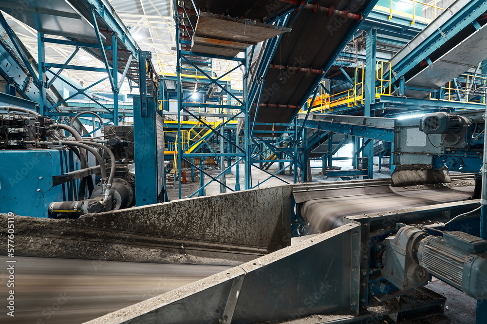 Fototapeta premium Large production line with conveyors carrying trash at plant