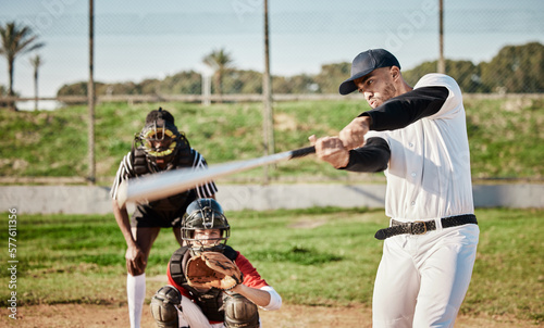 Baseball, bat and swinging with a sports man outdoor, playing a competitive game during summer. Fitness, health and exercise with a male athlete or player training on a field for sport or recreation
