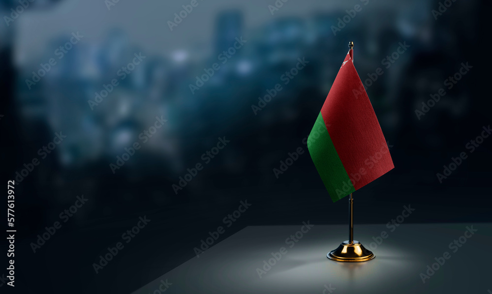 A small Belarus flag on an abstract blurry background