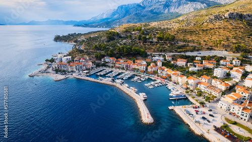 Fototapeta Naklejka Na Ścianę i Meble -  Take in the breathtaking view of Croatia's ports and marinas from above, showcasing luxurious yachts in a stunning drone photo.