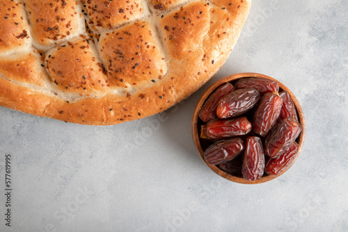  Date fruits,traditional ramadan pita on bright background,top view photo