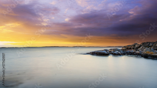 Coastal scene with sunset clouds  Sweden.