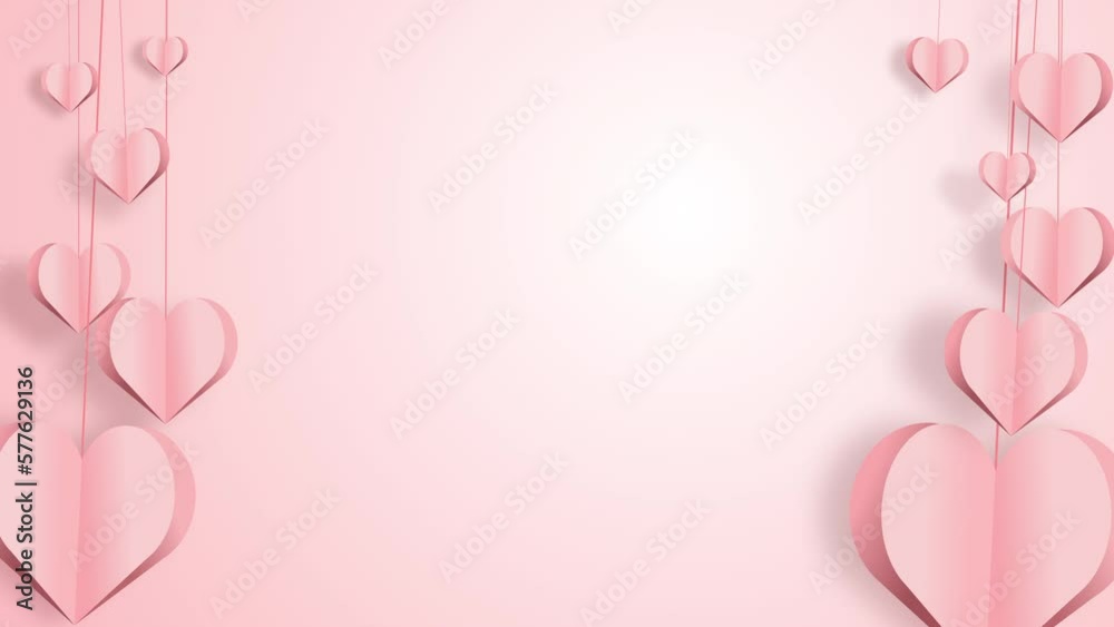 Paper heart shapes hang on strings flying on pink background. Symbols of love for Happy Women's, Mother's, Valentine's Day, birthday greeting card design. Paper heart shapes hang on strings flying on pink background. Symbols of love for Happy Women's, Mother's, Valentine's Day, birthday greeting card design.