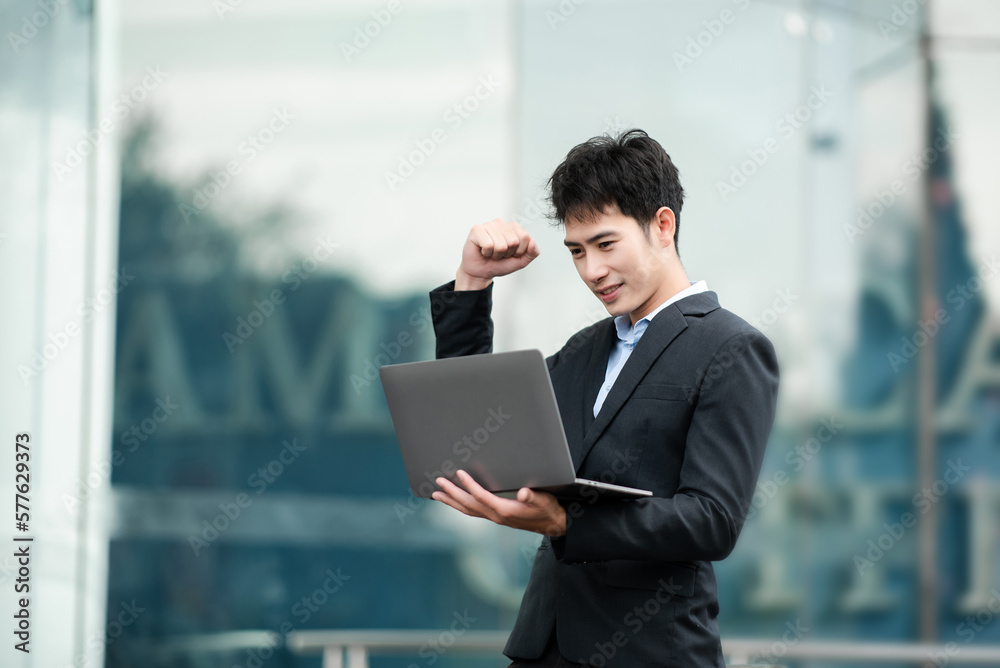 Portrait of business man holding laptop.Office worker at business center.. Portrait of business man holding laptop.Office worker at business center..
