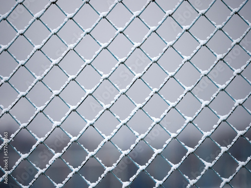 fence mesh in the snow close-up
