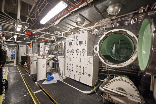 View of outside the divers decompression chamber with controls for operating and entrance to it from normal atmosphere.