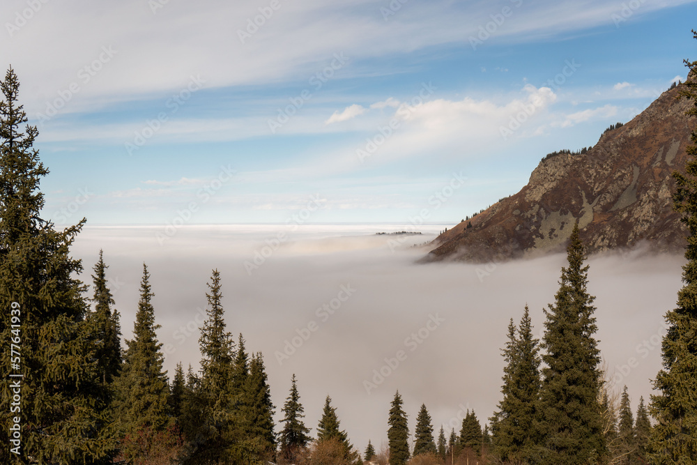 Blue sky above the clouds that covered the earth