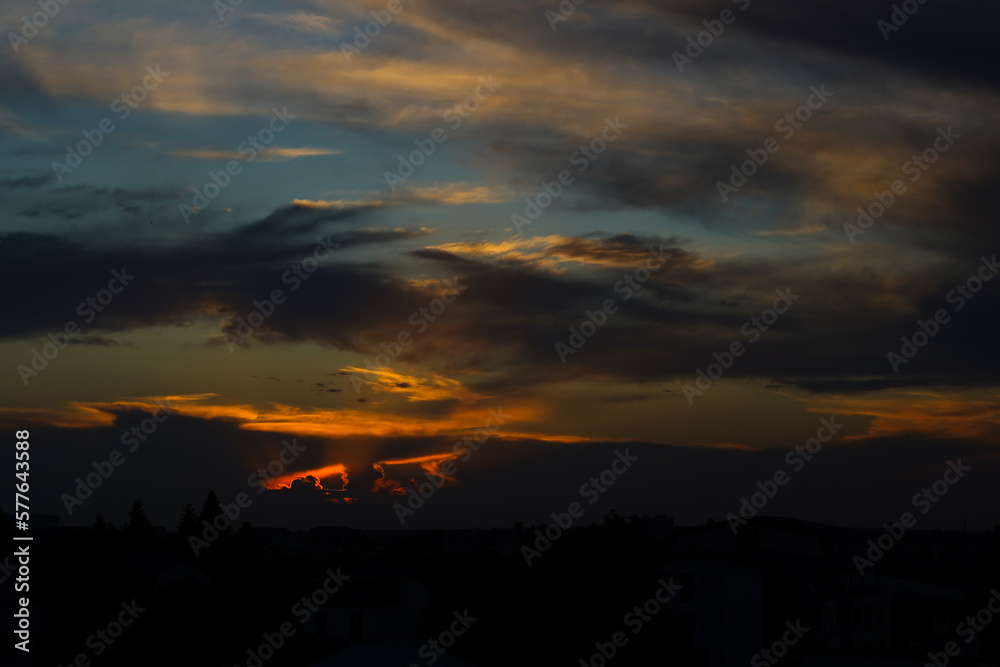 dramatic sunset. color. background with clouds.