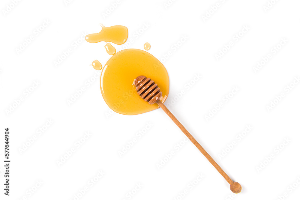 Honey with honey dipper isolated on white background. Top view. Honey with honey dipper isolated on white background. Top view.