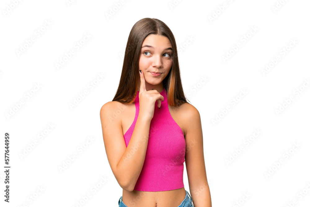 Teenager caucasian girl over isolated background and thinking Teenager caucasian girl over isolated background and thinking