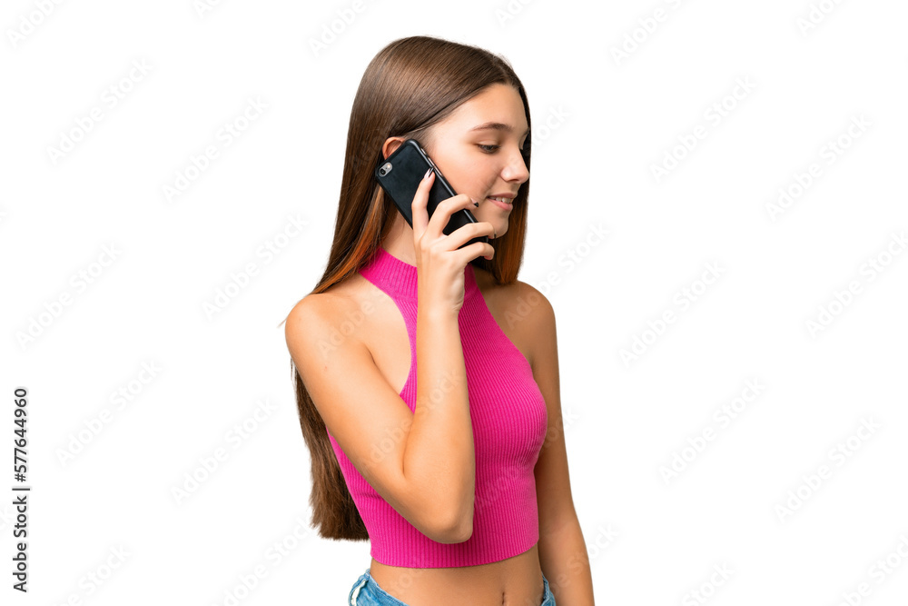 Teenager caucasian girl over isolated background keeping a conversation with the mobile phone with someone