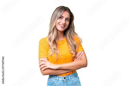 Foto Young Uruguayan woman over isolated background keeping the arms crossed in front