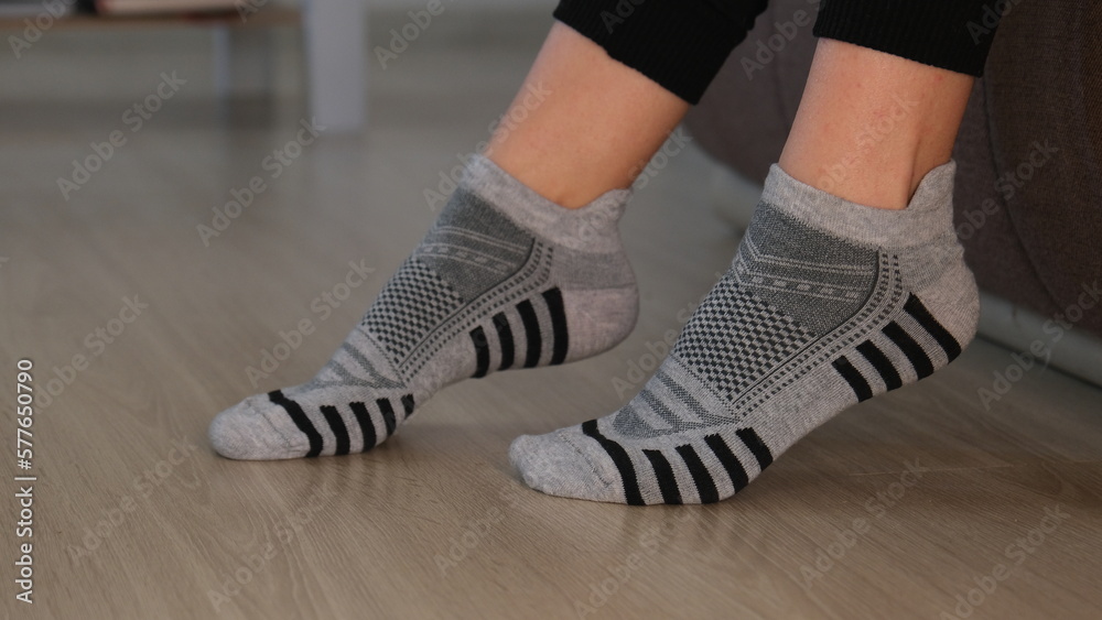 close-up pair of gray patterned unisex socks close-up pair of gray patterned unisex socks