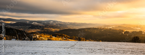 Panoramic view of winter mountain landscape in the evening. Paseky nad Jizerou, Giant Mountains, Czech Republuc photo
