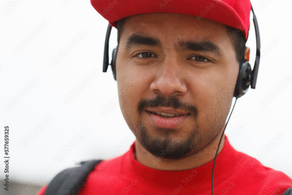 Fototapeta premium Young black boy listening to music in headphones