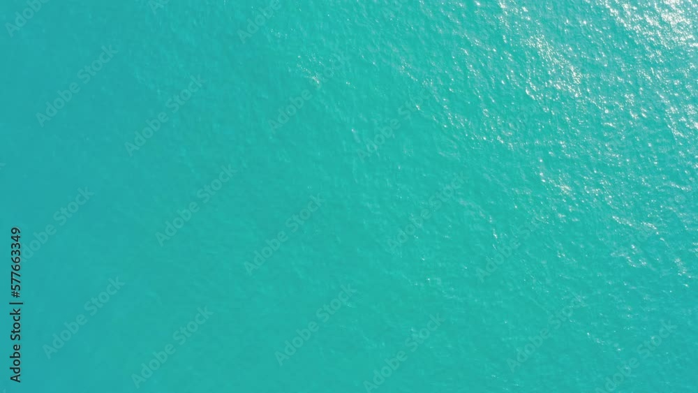 Water surface clean texture background aerial view. Ocean wave. Water surface clean texture background aerial view. Ocean wave.