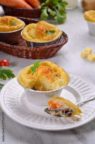 Pastel Tutup (Shepherd's Pie) is Traditional British pie. It is made from mashed potato, minced beef, mushroom, spices and herbs.
