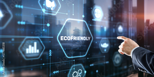 Businessman clicks Eco friendly. Earth energy concept
