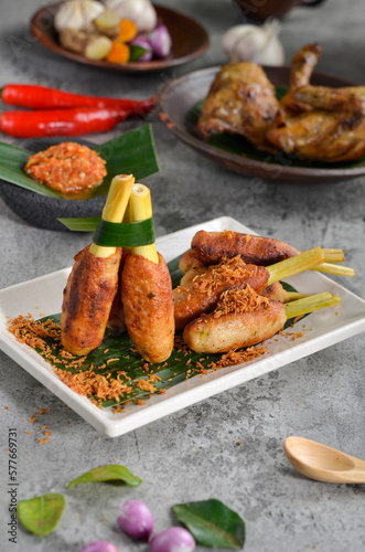 Satay Lilit is a satay from Balinese. It made from minced pork, fish, chicken, or beef meat, which is then mixed with grated coconut, thick coconut milk, lemon juice, shallots, and pepper. 
