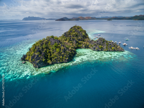 Malwawey Coral Garden in Coron, Palawan, Philippines. Mountain and Sea in background. Tour A.