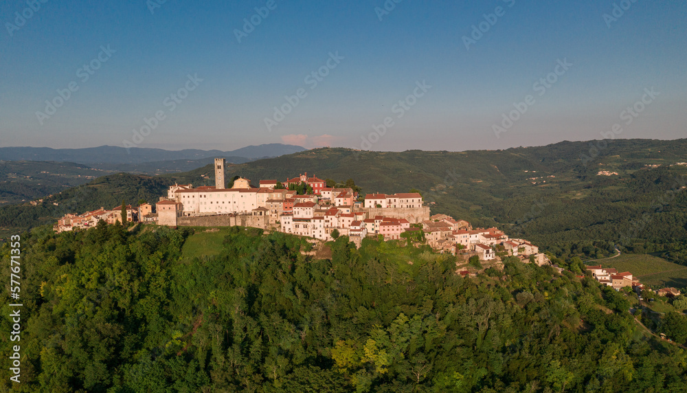 Naklejka premium Motovun Village in Croatia. It is a village and a municipality in central Istria, Croatia. In ancient times, both Celts and Illyrians built their fortresses at the location of present-day Motovun.