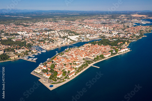Aerial shot of Zadar old town, famous tourist attraction in Croatia. Waterfront aerial summer view, Dalmatia region of Croatia. photo