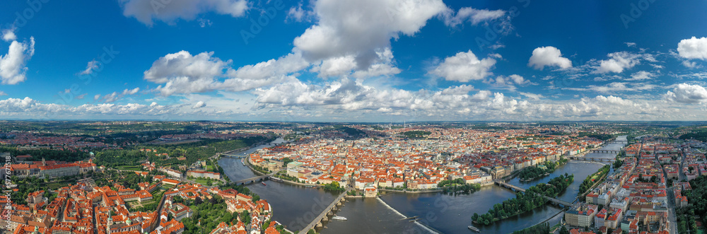 Prague Old Town in Czech Republic with Famous Sightseeing Places in Background. Charles Bridge Iconic 14th century Structure with View, Vltava river and Prague Cityscape. Must Visit City