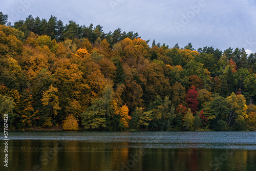 Autumn colors Trees and Forest in Lithuania. Green Lakes. Zalieji ezerai. Landscape and Nature. Lake in foreground. photo