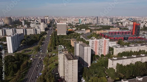 Air view of the avenue with developed infrastructure. One of moskovsky avenues with modern buildings in a green area photo