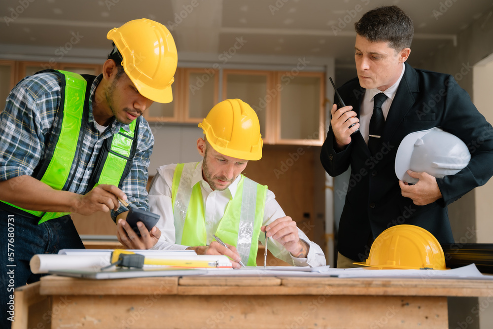 Architect man brainstorm collaboration ideas pointing blueprints at construction site inspection. Architect man brainstorm collaboration ideas pointing blueprints at construction site inspection.