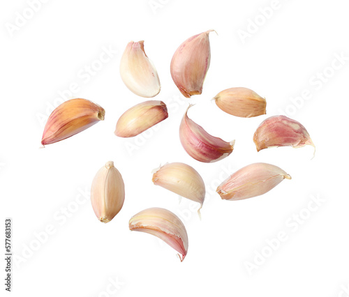 A collection of garlic cloves isolated on a flat background. photo
