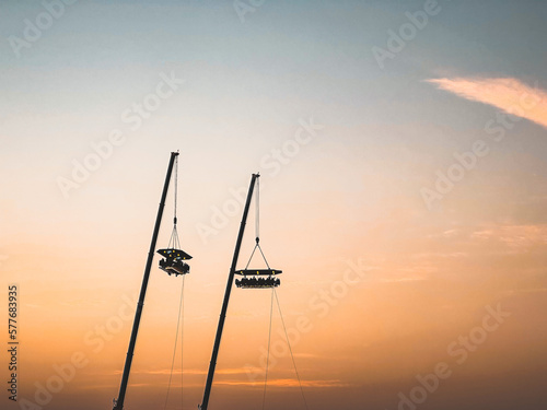 Photography Dubai Marina dinner in the sky at sunset, in Dubai, United Arab Emirates