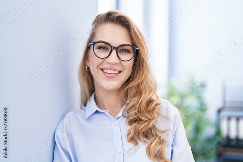 Young blonde woman business worker smiling confident at office