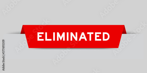 Red color inserted label with word eliminated on gray background