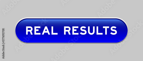 Blue color capsule shape button with word real results on gray background
